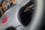ALL BLACK PERFORATED 18 INCH LACED-ON STEERING COVER TO MATCH KENWORTH AND PETERBILT SPOKE PATTERN
